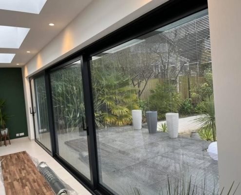 Reynaers Lift & Slide Doors with Electric Blinds